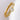 An 18ct yellow gold solitaire diamond engagement ring with a frosted finish and patterned band.