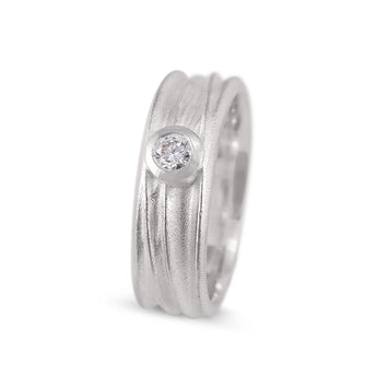 White gold diamond ring on white background