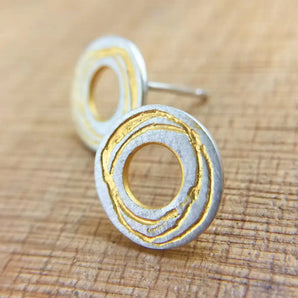 CircularSilverEarringsWithGoldDetail