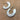 A pair of silver hoop earrings with etched patterns, displayed against a wooden background.