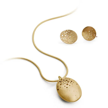 A gold necklace with a seed head pattern and matching dome earrings on a white background