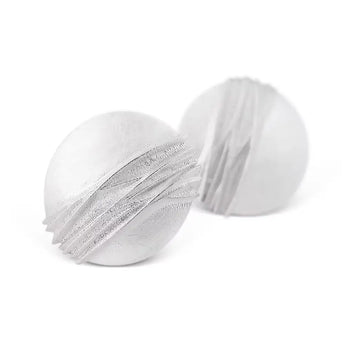 A pair of silver earrings with a round shape and geometric patterns, set against a white background.