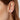 A pair of silver earrings with a spiral pattern, showing a satin finish and precision drilling, displayed against a white background.