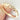 modern gold eternity ring with small diamonds on a light background by Kate Smith Jewellery Birmingham