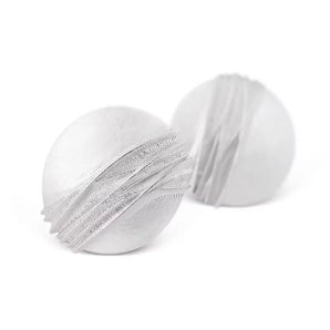 A pair of silver earrings with a round shape and geometric patterns, set against a white background.